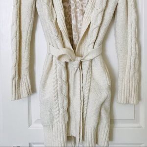 Jennifer Lopez  belted Sweater